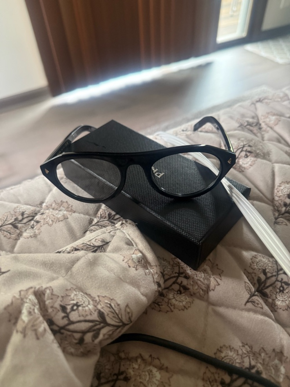 Prada Black Cat-Eye Sunglasses with Gold Accents - Picture 12 of 12